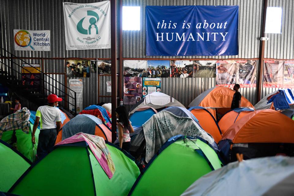 Families with children live in tents the Movimiento Juventud 2000 shelter with refugee migrants from Central and South American countries including Honduras and Haiti seeking asylum in the United States, as Title 42 and Remain In Mexico border restrictions continue, in Tijuana, Baja California state, Mexico on April 9, 2022.