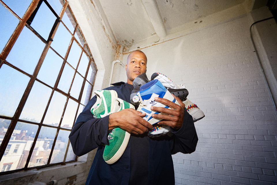 Heron Preston with some of his sneakers that will be auctioned off via eBay. - Credit: Courtesy of eBay