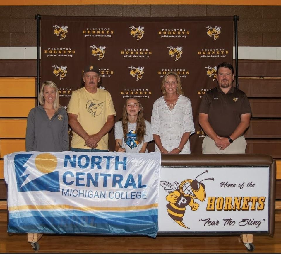 Pellston’s Madison Brown has also signed to play college volleyball at North Central Michigan College (NCMC) this upcoming fall. In this photo are (from left to right) Pellston volleyball coach Ashley Vieau, father Scott Clear, Madison Brown, mother Kerri Brown, and Pellston athletic director Chris Schlappi.