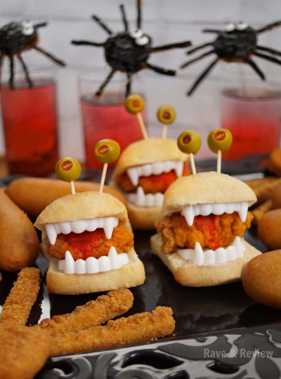 <p>Add in some fake fangs and voila! You’ve got instant creepy (yet savory) critters to jazz up any party platter. They’re almost too cute to eat. (Almost.)</p><p><a href="https://raveandreview.com/2018/10/spooky-swizzle-sticks-and-chicken-sliders-for-halloween.html" rel="nofollow noopener" target="_blank" data-ylk="slk:Recipe from Rave & Review" class="link "><em>Recipe from Rave & Review</em></a></p>