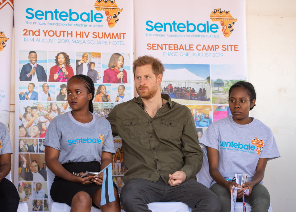 The Duke of Sussex joins in a confidence building exercise with young people including Tlotlo Moilwa (left), during a visit to the Kasane Health Post, run by the Sentebale charity, in Kasane, Botswana.