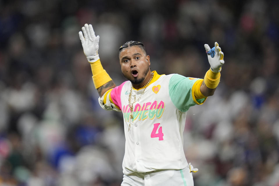 San Diego Padres' Luis Arraez celebrates after hitting a walkoff single during the ninth inning of a baseball game against the Los Angeles Dodgers, Friday, May 10, 2024, in San Diego. The Padres won, 2-1. (AP Photo/Gregory Bull)