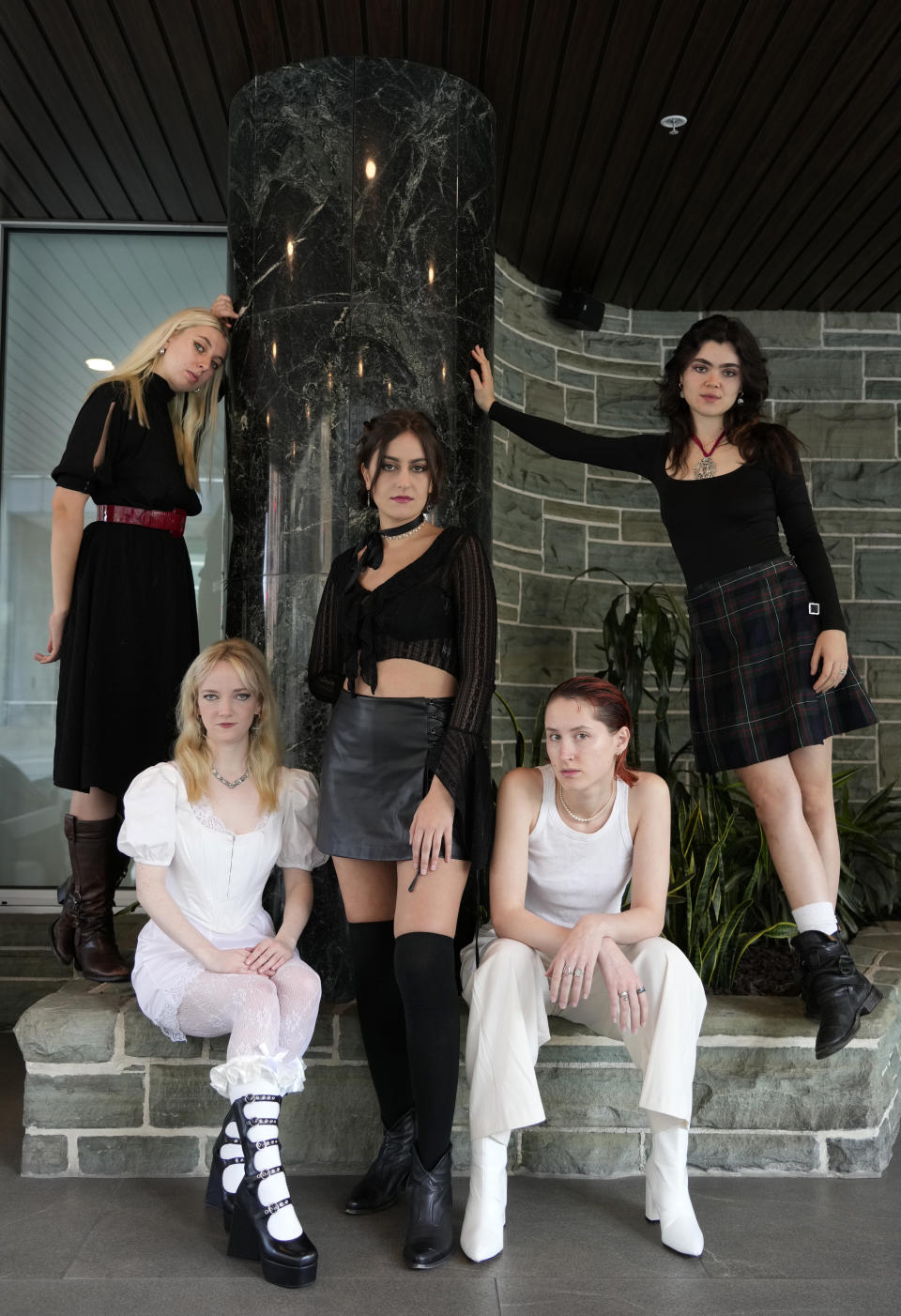 Georgia Davies, from left, Emily Roberts, Aurora Nishevci, Lizzie Mayland and Abigail Morris of the indie rock band The Last Dinner Party pose for a portrait, Tuesday, Nov. 7, 2023, at the AC Hotel by Marriott in Los Angeles. (AP Photo/Chris Pizzello)