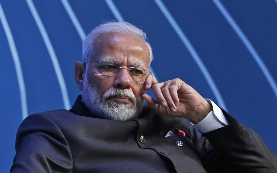 FILE - In this Nov. 13, 2019, file photo, Indian Prime Minister Narendra Modi attends the BRICS Business Council prior to the 11th edition of the BRICS Summit, in Brasilia, Brazil. From industrialists and foreign companies to celebrities and ordinary citizens, people from all walks of life pitched in for a newly created fund touted to strengthen India’s fight against the deadly virus the next day. More than three months later, the Prime Minister’s Citizen Assistance and Relief in Emergency Situations Fund, or the PM CARES fund, is now valued at more than $1 billion but has since run into controversy over an alleged lack of transparency and accountability, along with a general lack of clarity over the control, the donors and the use of money donated to it. (AP Photo/Eraldo Peres, File)