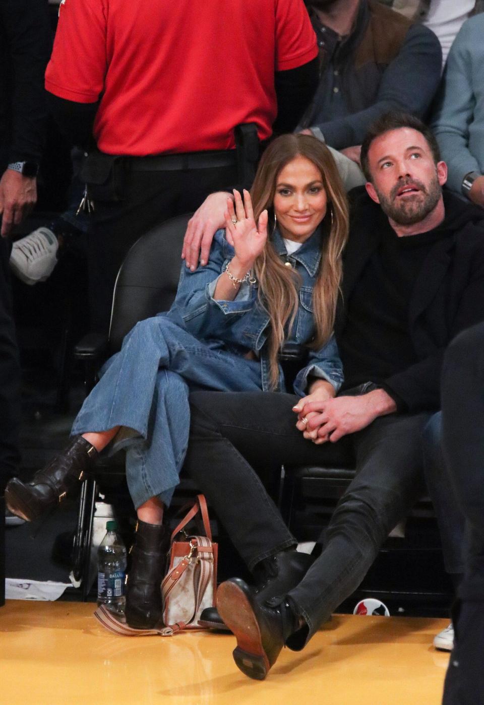 Jennifer Lopez and Ben Affleck attend the Lakers game against Boston