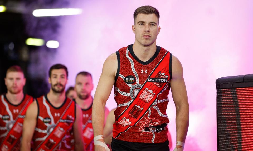 <span>Essendon captain Zach Merrett has led the Bombers up to second place on the AFL ladder after years of false dawns.</span><span>Photograph: Dylan Burns/AFL Photos/Getty Images</span>