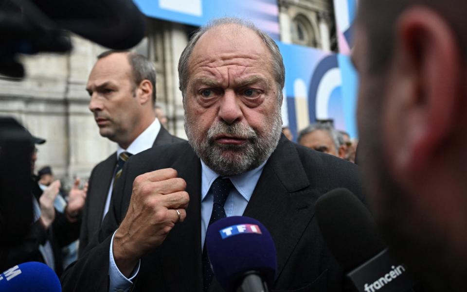 Eric Dupond-Moretti, the French Justice Minister, spoke to journalists during the demonstration