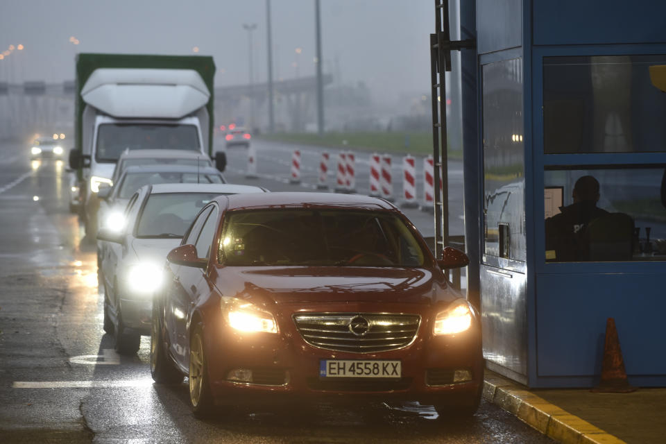 Passengers wait to cross the border between Croatia and Slovenia at the Bregana border crossing, Thursday, Dec. 8, 2022. European Union countries are weighing on Thursday whether the bloc’s three newest members — Bulgaria, Romania, and Croatia — can fully open their borders and participate in Europe’s ID-check-free travel zone, but more delays to their entry appear likely. (AP Photo)