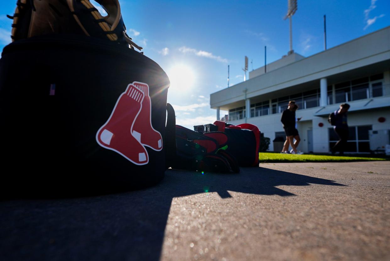 Gear sits ready as Boston Red Sox pitchers and catchers report for the first day of spring training in Fort Myers, Fla., on Wednesday.