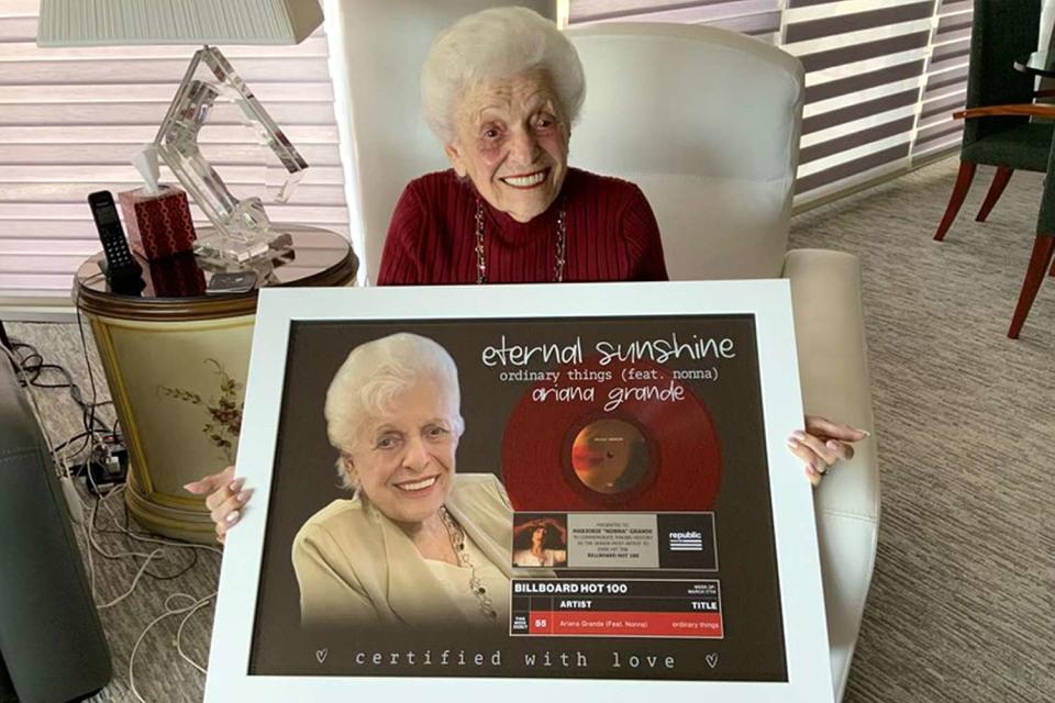 <p>Courtesy of Republic Records</p> Marjorie "Nonna" Grande holding up her "Ordinary Friends" Hot 100 plaque