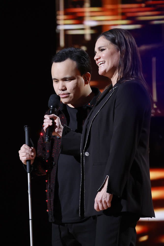 Kodi Lee stands with his mother, Tina Lee, on the stage of “America’s Got Talent: Fantasy League.” | Trae Patton, NBC