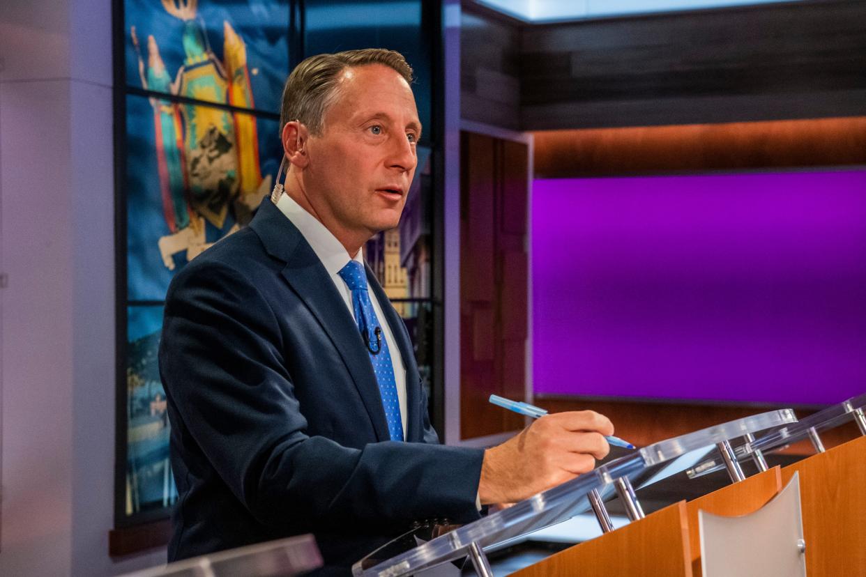 Former Westchester County Xxecutive Rob Astorino writes down notes before speaking at New York's Republican gubernatorial debate at the studios of Spectrum News NY1 on Monday.
