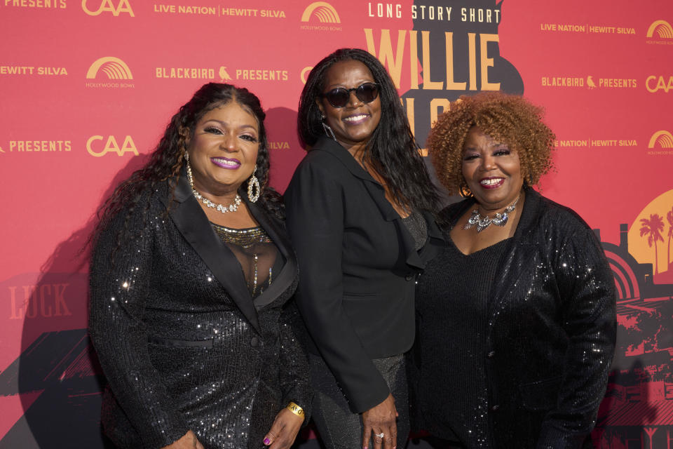 Regina McCrary, from left, Alfreda McCrary and Ann McCrary of The McCrary Sisters arrive at Willie Nelson 90, celebrating the singer's 90th birthday on Saturday, April 29, 2023, at the Hollywood Bowl in Los Angeles. (Photo by Allison Dinner/Invision/AP)