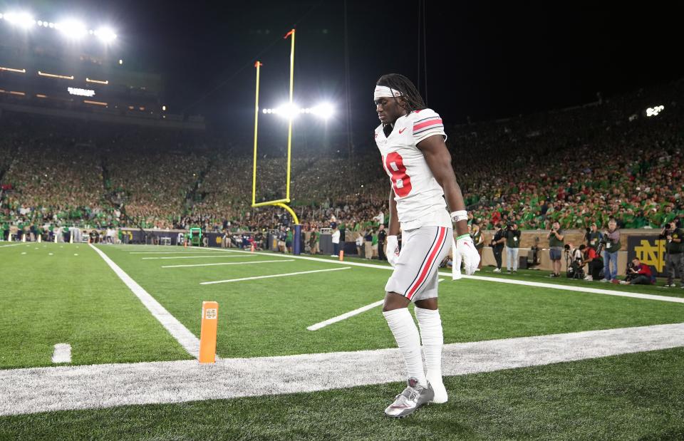 Sep 23, 2023; South Bend, Indiana, USA; Ohio State Buckeyes wide receiver Marvin Harrison Jr. (18) tests out his ankle after leaving the game against Notre Dame Fighting Irish during the third quarter at Notre Dame Stadium.