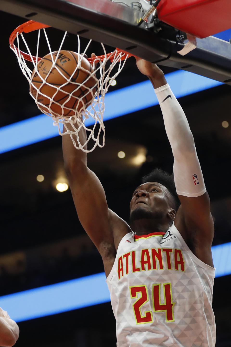 Atlanta Hawks forward Bruno Fernando (24) scores in the first half of an NBA basketball game against the Philadelphia 76ers, Monday, Oct. 28, 2019, in Atlanta. (AP Photo/John Bazemore)