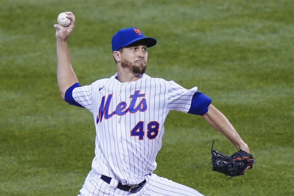 New York Mets starting pitcher Jacob deGrom throws in the first inning of a baseball game against the Miami Marlins, Wednesday, Aug. 26, 2020, in New York. (AP Photo/John Minchillo)