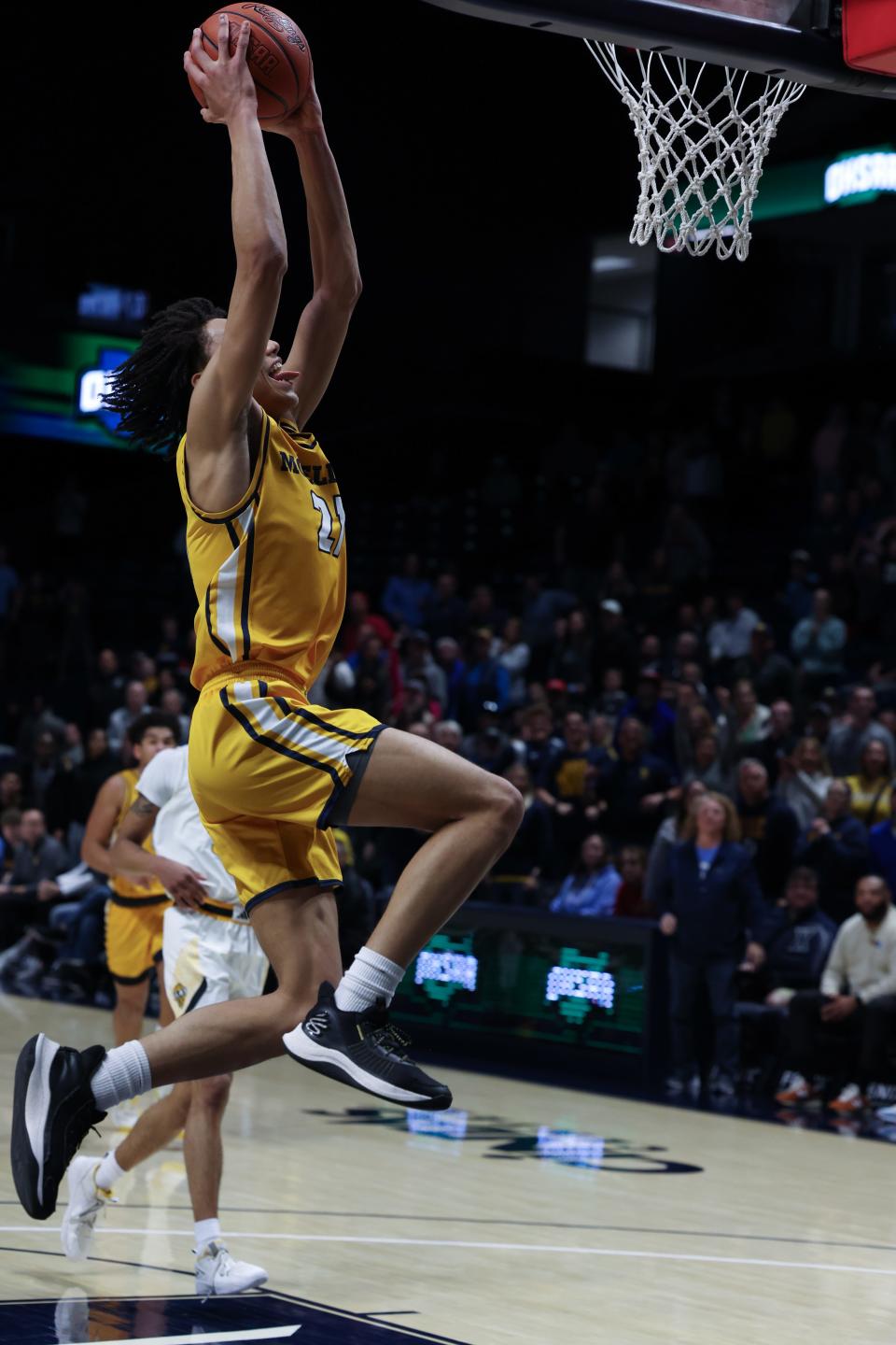 Alex Kazanecki of Moeller on this dunk gives them a 63-57 lead with 1:36 left in the first overtime. Moeller played Centerville High School in a Division I regional final. Centerville won in double overtime 70-69.