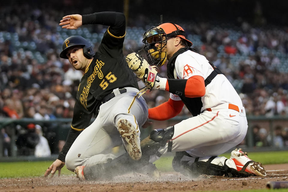 San Francisco Giants catcher Patrick Bailey, right, tags out Pittsburgh Pirates' Jason Delay at home during the fifth inning of a baseball game in San Francisco, Tuesday, May 30, 2023. (AP Photo/Jeff Chiu)