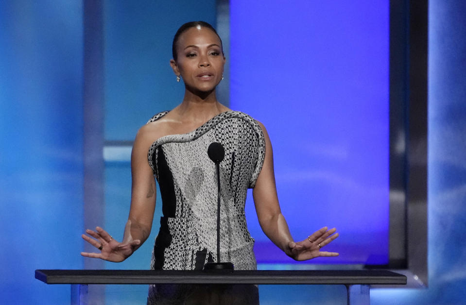 Actor Zoe Saldana speaks from the stage during the 49th AFI Life Achievement Award tribute to Nicole Kidman, Saturday, April 27, 2024, at the Dolby Theatre in Los Angeles. (AP Photo/Chris Pizzello)
