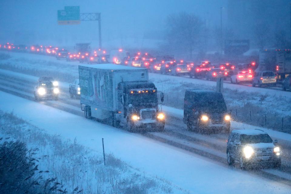 Conditions are slippery along northbound and southbound I-41 on Tuesday afternoon during a snowstorm in Appleton. Traffic was backed up at State 441 South exit due to a traffic incident.