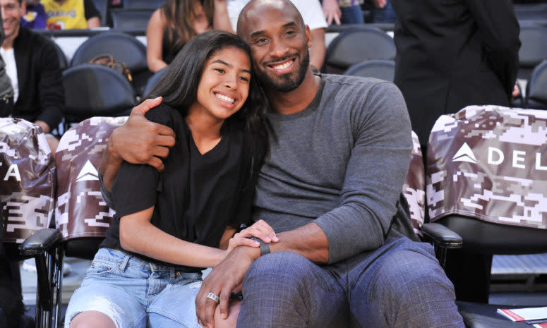 Kobe Bryant and his daughter Gianna at a Lakers game.