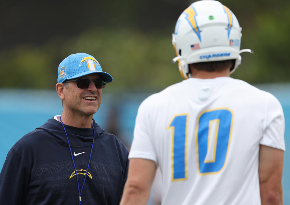 Chargers coach Jim Harbaugh and quarterback Justin Herbert are an intriguing match. (Photo by Harry How/Getty Images)