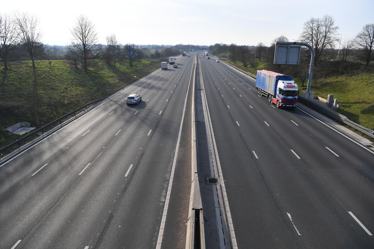 A picture shows an empty M6 motorway at Sandbach in Cheshire, northwest England, during what would normally be the busy morning rush hour on March 24, 2020 after Britain ordered a lockdown to slow the spread of the novel coronavirus. - Britain was under lockdown March 24, its population joining around 1.7 billion people around the globe ordered to stay indoors to curb the "accelerating" spread of the coronavirus. (Photo by Paul ELLIS / AFP) (Photo by PAUL ELLIS/AFP via Getty Images)