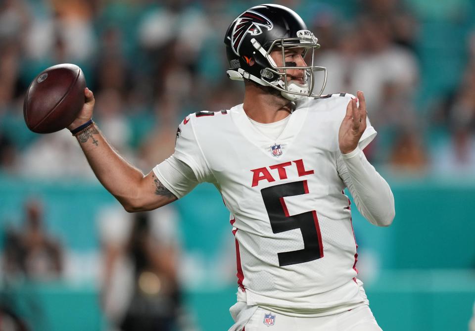 Aug 21, 2021; Miami Gardens, Florida, USA; Atlanta Falcons quarterback AJ McCarron (5) attempts a pass against the Miami Dolphins during the first half at Hard Rock Stadium. Mandatory Credit: Jasen Vinlove-USA TODAY Sports