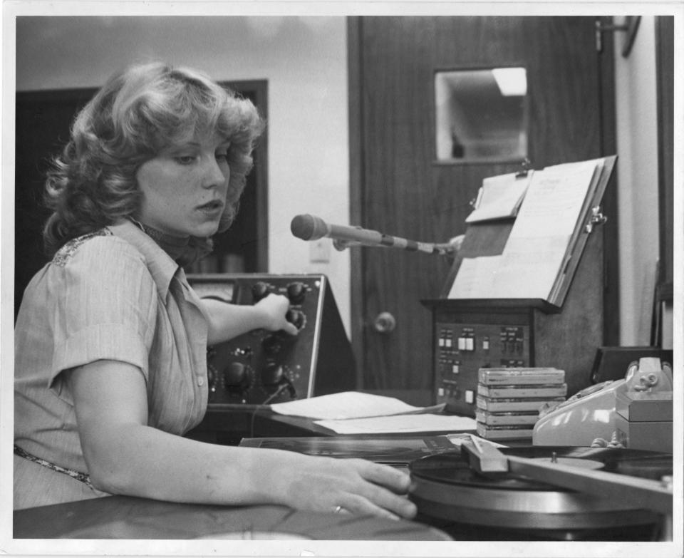 A young Delilah works the station at KDUN in Reedsport, Oregon.