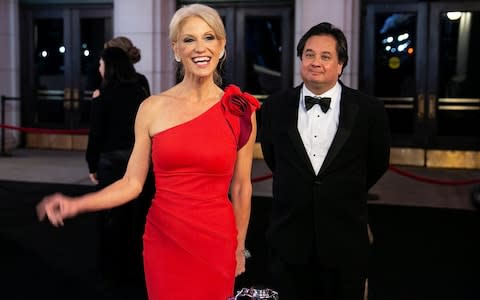 White House Counselor Kellyanne Conway and her husband George arrive for a dinner on the eve of Donald Trump's Inauguration  - Credit: Reuters