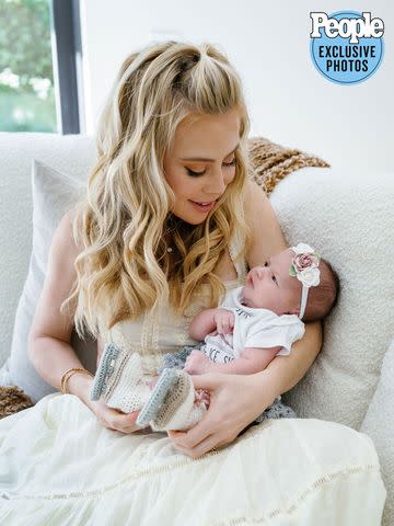 <p>Jenny Quicksall Photography</p> Tara Lipinski and baby Georgie