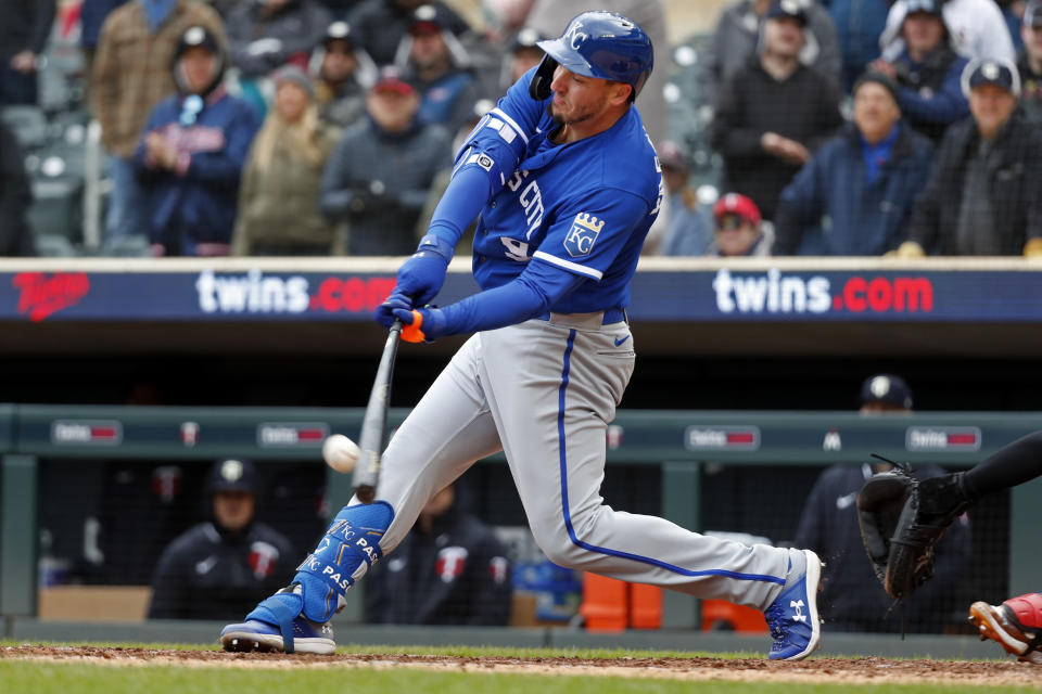 Kansas City Royals' Vinnie Pasquantino hits a two-run single against the Minnesota Twins in the ninth inning of a baseball game Sunday, April 30, 2023, in Minneapolis. (AP Photo/Bruce Kluckhohn)