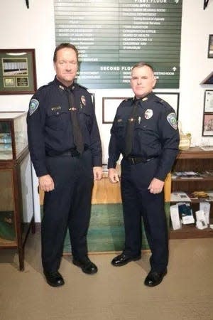 Sean Gibbons, right, replaced the retiring Patrick Swanick as Wayland police chief last December.