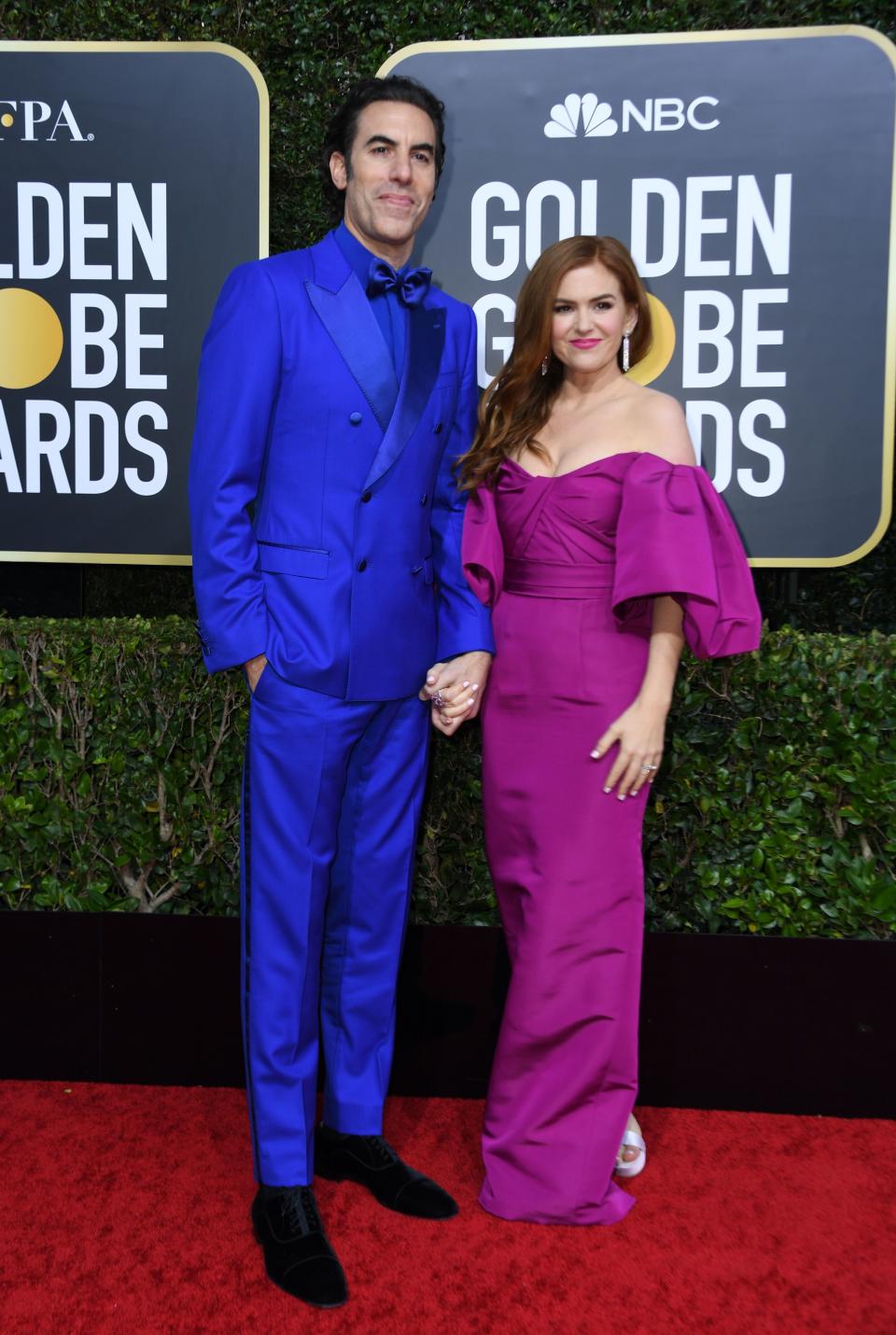 Actor Sacha Baron Cohen and his wife actress Isla Fisher arrive for the 77th annual Golden Globe Awards on January 5, 2020, at The Beverly Hilton hotel in Beverly Hills, California. (Photo by VALERIE MACON / AFP) (Photo by VALERIE MACON/AFP via Getty Images)