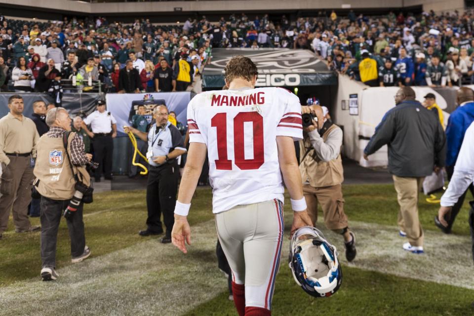 Eli Manning is at the center of a lawsuit involving allegedly fraudulent memorabilia. (AP)