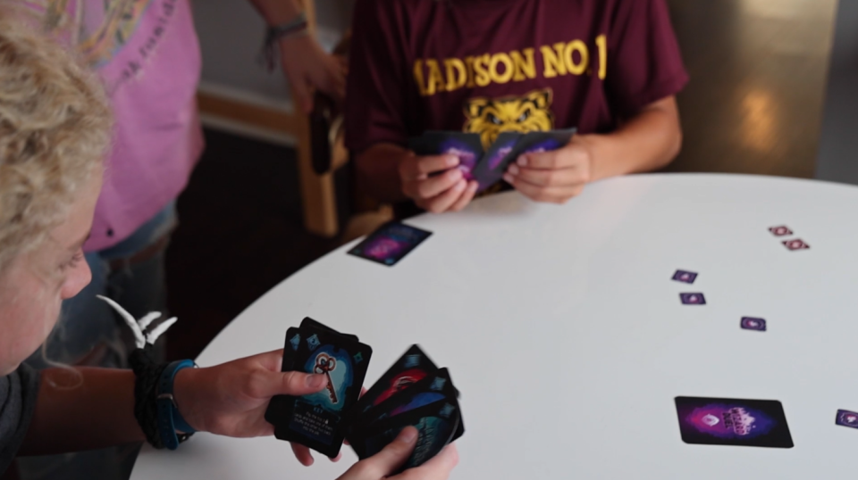 Kids play Arcaven's Duel, a card game created by an Arizona teen.