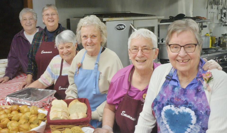 Emmaus Soup Kitchen veteran volunteers gather before serving guests in Erie on Jan. 9, 2024. The Benedict Sisters and volunteers have been serving meals for those in need in Erie for 50 years. The women served guests on the first shift 50 years ago, and are from left to right, Margaret Kloecker, 73; Sr. Dianne Sabol, OSB, 71; Sr. Lucia Surmik, 90; Sr. Roseanne Lindal-Hynes, 87; Sr. Marcia Sigler, 80; and Sr. Carolyn Gorny-Kopkowski, who was executive director from 1974-1981.