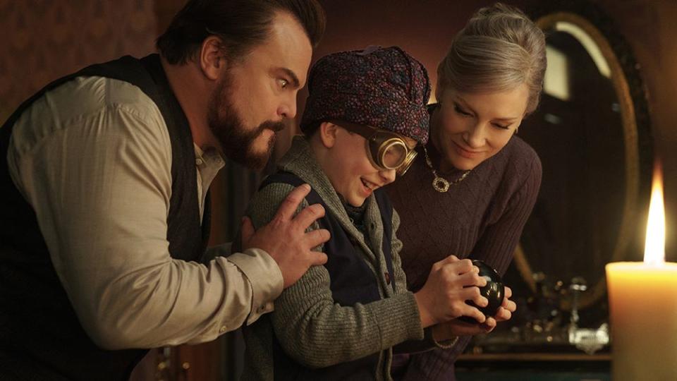 two magical guardians, jack black and cate blanchett, rally around a young boy in 'the house with a clock in its walls,' a good housekeeping pick for best halloween movies for kids