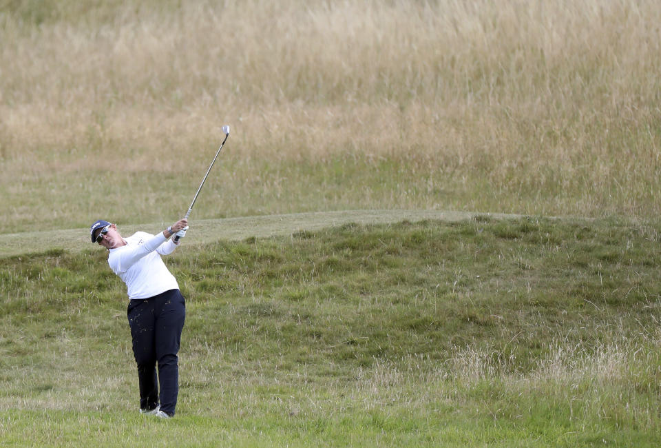 South Africa's Ashleigh Buhai plays her 2nd shot on the 2nd fairway during the final round of the Women's British Open golf championship, in Muirfield, Scotland Sunday, Aug. 7, 2022. (AP Photo/Scott Heppell)