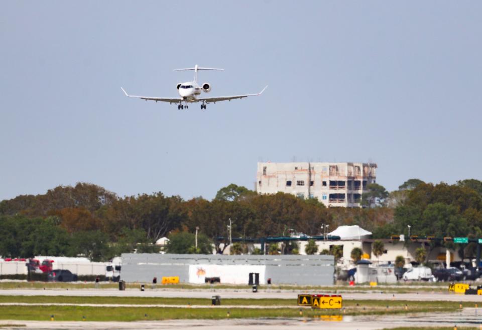 Planes land at the Naples Airport on Thursday, March 14, 2024.
