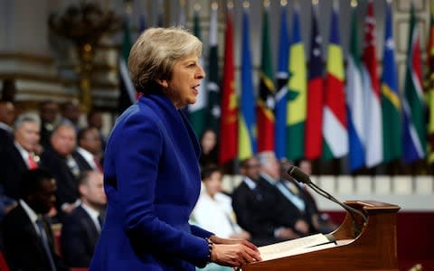 Theresa May delivers her speech at Buckingham Palace - Credit: Jonathan Brady /PA