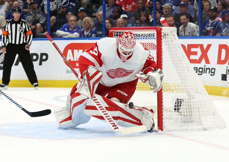 Red Wings goaltender Ville Husso makes a save against the Lightning during the first period on Thursday, April 13, 2023, in Tampa, Florida.