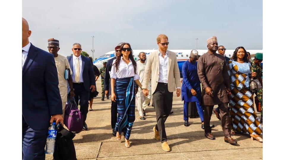 Prince Harry, Duke of Sussex and Meghan, Duchess of Sussex arrive at the Lagos airport for Official State Welcome