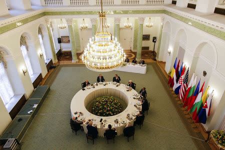 U.S. President Barack Obama and Polish President Bronislaw Komorowski co-host a meeting with Central and Eastern European Leaders at the Presidential Palace in Warsaw in this handout photo provided by KPRP on June 3, 2014. REUTERS/ Wojciech Grzedzinski/KPRP/Handout via Reuters