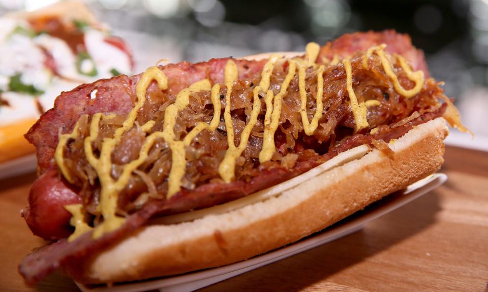 The Dog n’ Brat Show was among the new foods introduced Tuesday by the Milwaukee Brewers at American Family Field. Maxie’s, Blue’s Egg and Story Hill BKC are among the collaborators for the new food offerings.