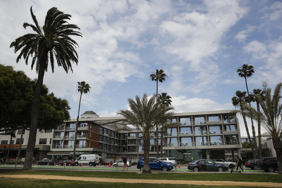 FILE - This May 6, 2019, file photo shows the Shore Hotel in Santa Monica, Calif. The beachfront hotel built without proper permits and fined nearly $15.6 million will be allowed to remain open. After hours of debate the California Coastal Commission voted 7-5 Thursday, Dec. 12, 2019, to approve after-the-fact permits for the Shore Hotel, the Los Angeles Times reported Friday. (AP Photo/Jae C. Hong, File)