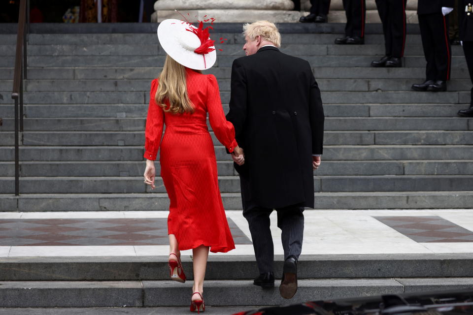 British Prime Minister Boris Johnson and his wife Carrie Symonds arrive for the National Service of Thanksgiving held at St Paul's Cathedral during the Queen's Platinum Jubilee celebrations in London, Britain, June 3, 2022. REUTERS/Henry Nicholls/Pool