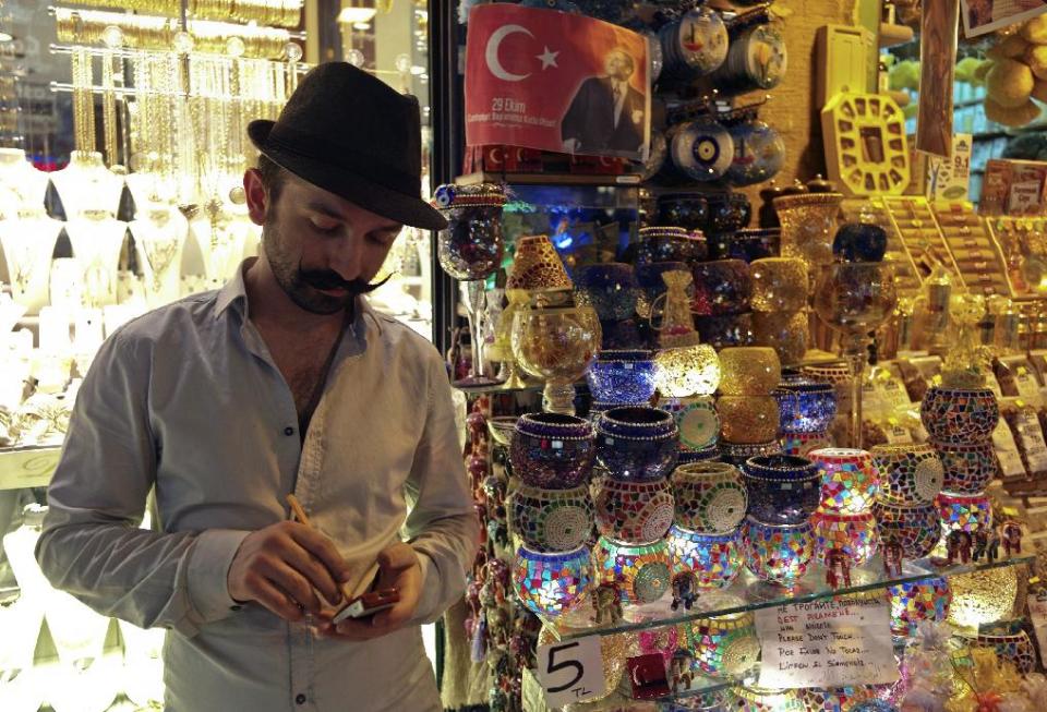 A man walks in the 17th century Spice Market, or the Egyptian Bazaar, with stalls beautifully displaying spices, dried fruit, nuts, apple tea, essential oils, and “Turkish Delight” candy in Istanbul, Turkey, Tuesday, Oct. 29, 2013. Last summer, Istanbul’s Taksim Square was the scene of violent confrontations between police and protesters. But protests have faded, and contrary to some lingering perceptions, it’s quite calm now _ except for the normal hustle and bustle found in this vibrant city. And it’s as safe for tourists as it ever was. Istanbul is a thoroughly modern place, but it traces its roots back to 660 B.C. It’s the former seat of the opulent Byzantine and Ottoman empires and is divided into European and Asian sides by the Bosporus Strait, offering a wealth of history and stunning scenery.(AP Photo)