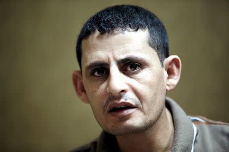 Saad Khalaf Ali, one of the 69 hostages rescued from an Islamic State prison in a joint raid by U.S. and Kurdish special forces, speaks during an interview with Reuters in Erbil, Iraq, in this October 29, 2015 file photo. REUTERS/Azad Lashkari/Files