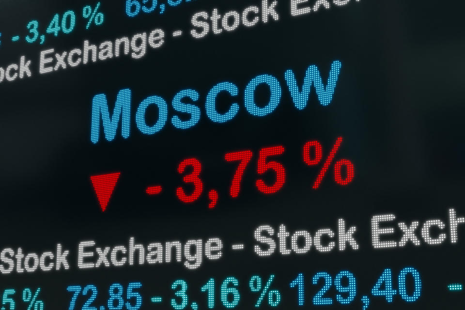 Russia Moscow, negative stock market data on a trading screen. Red percentage sign and ticker information. Stock exchange and business concept. 3D illustration